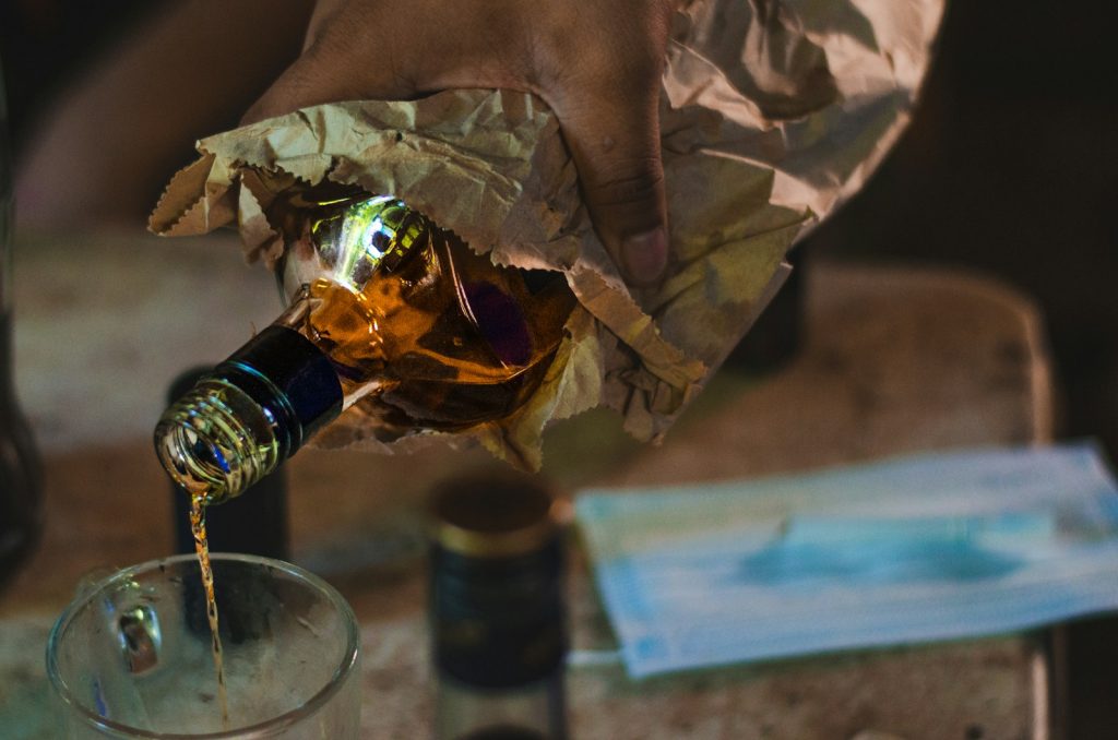 Pouring drink for Alcohol Abuse