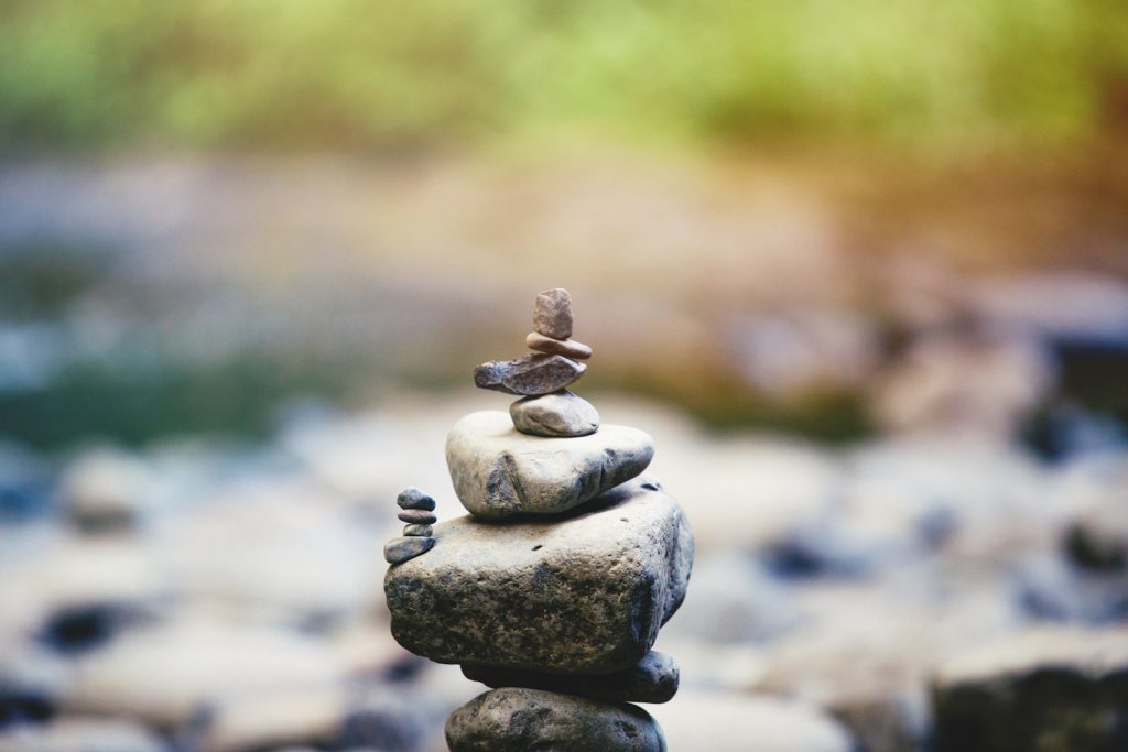 holistic therapy rocks stacked in plies